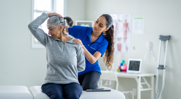 Professional physiotherapist providing treatment to patient at home in Riyadh.